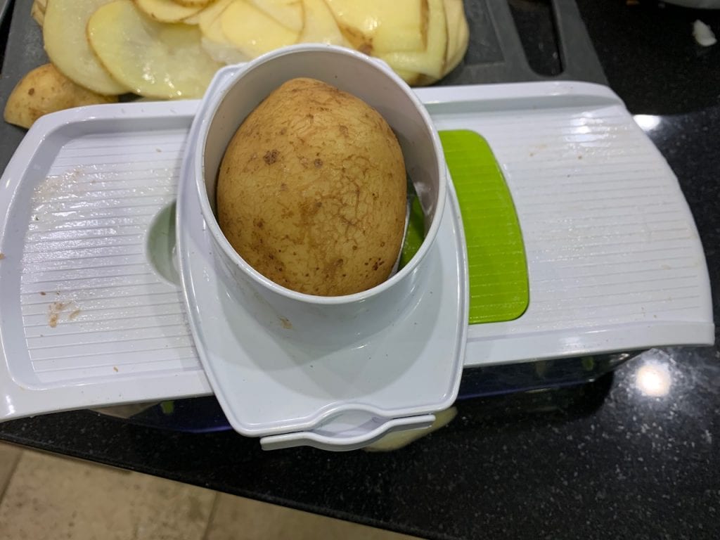 use a mandolin to slice the potatoes