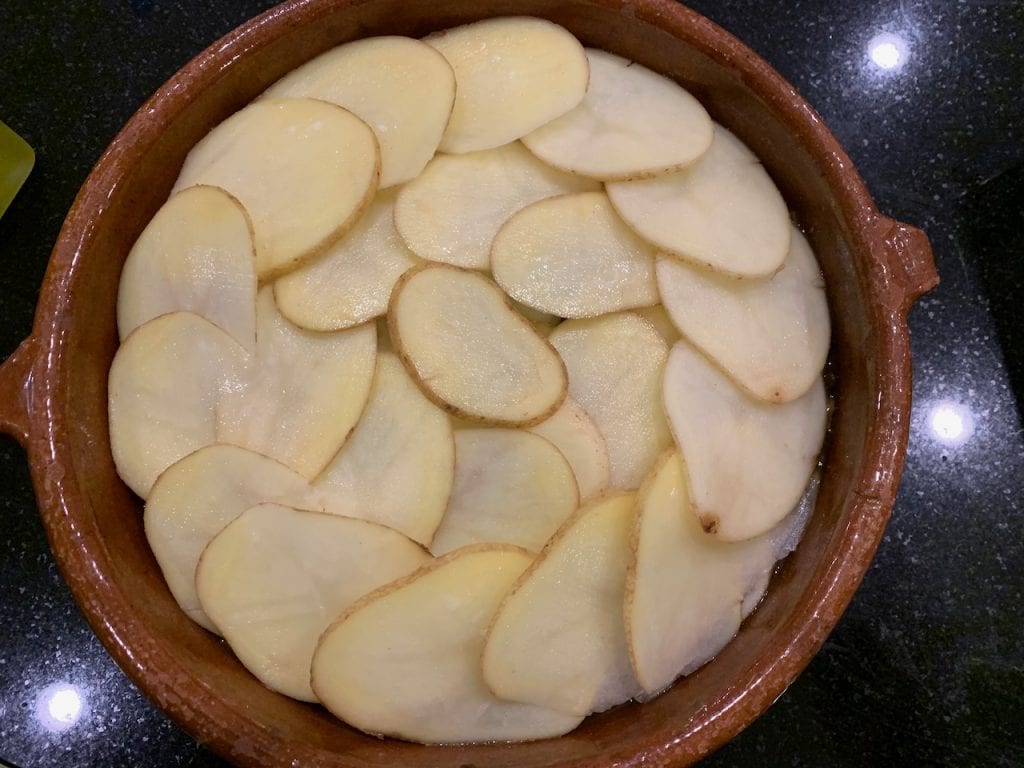 more layering the potato slices